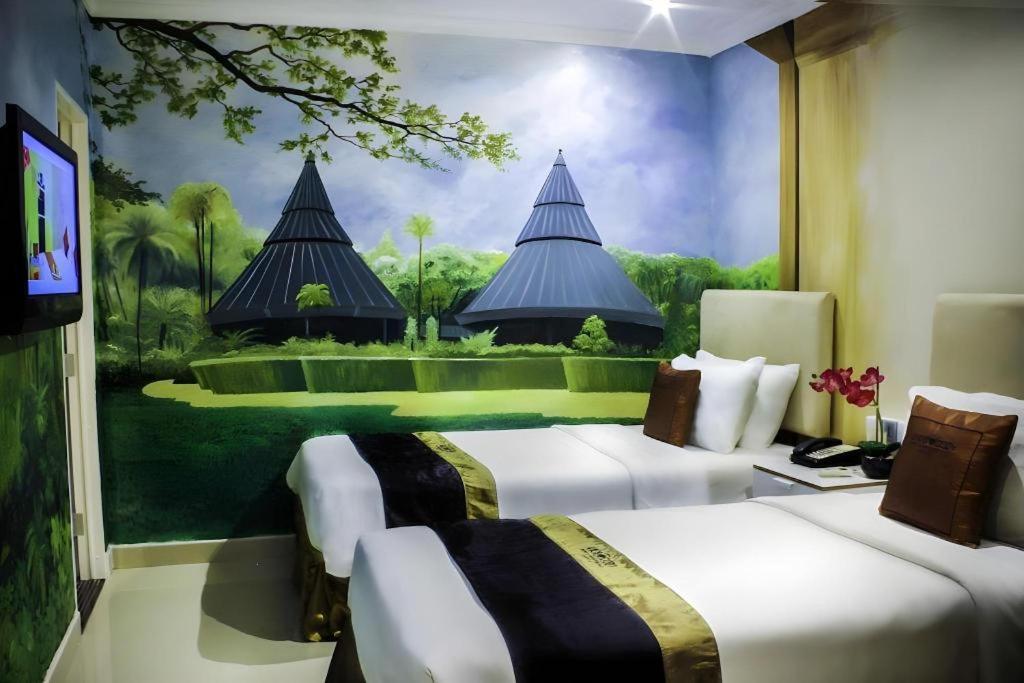 Amos Cozy Melawai Hotel