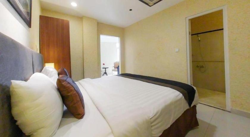 Hotel Amos Cozy Melawai 4*