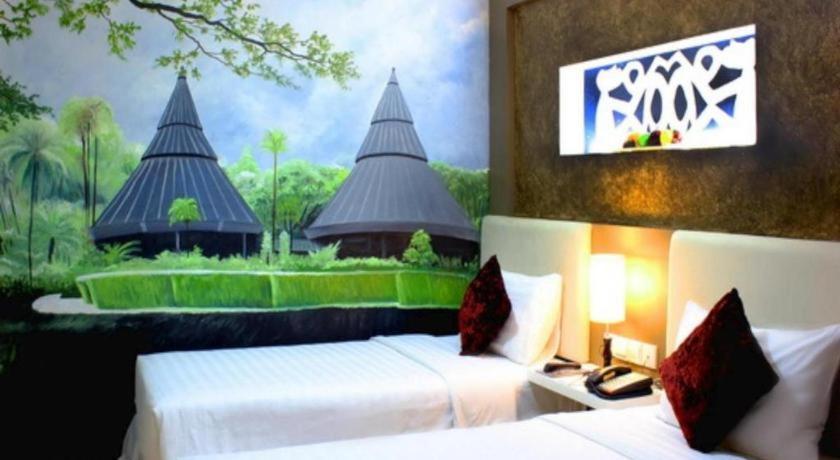 Amos Cozy Melawai Hotel 4*