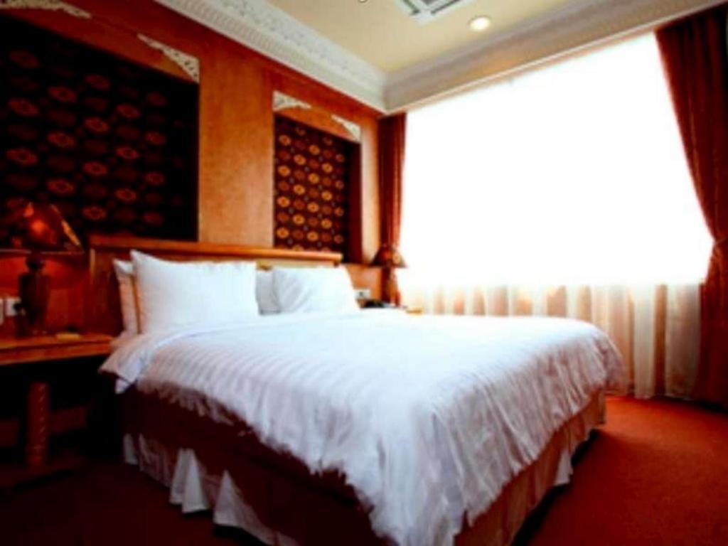Amos Cozy Melawai Hotel