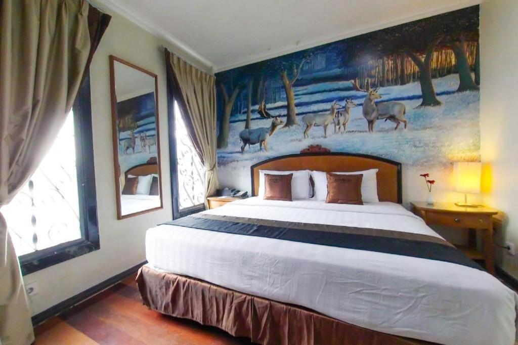 Amos Cozy Melawai Hotel